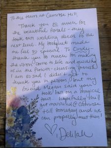 Handwritten wedding floral testimonial from a Camrose Hill bride